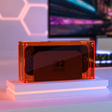 PlayVital Clear Acrylic Dustproof Cover for Nintendo Switch 2 , Magnetic Ventilation Top, Tool-Free Installation, Transparent Display Box for Switch 2 Dock Mode - Clear Orange - SGUNTM004